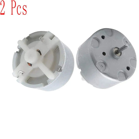 Dope Little Mini DC Motor Pack Of 2 Runs On 1.5 To 5 Volts, 2700 RPM, 32mm Diameter, shown with exposed gears and shaft