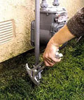 Emergency Gas Shut Off 4 In 1 Tool For Home Safety And Disaster Prep Gas And Water Valve Wrench Non Sparking Heat Treated Alloy Firefighter Tested Made In USA On Duty used to shut off gas valve outside a home.