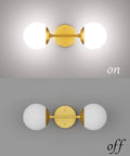 Gold Globe Wall Sconce With Two Lights, Mid Century Modern Globe Wall Light for Living Room in on and off mode, 6000K G9 Bulbs Included.