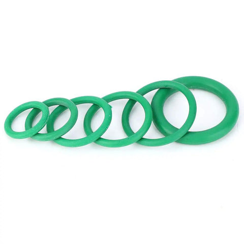 Green O-rings from 270 Pcs O Ring Kit With 18 Size Assortment High Temperature Buna N Rubber Gaskets For Automotive, Plumbing, Pneumatic, Pressure Washer And Gas Sealing, Leak Proof Seals For Faucets, Machinery, And More displayed in a line.