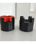 XL Star Type Jaw Coupling With Shock Absorbing Rubber Spider Center Built Like A Tank For Heavy Duty Motor Drives, shown in black and red.