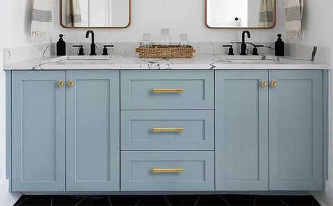 Champagne Bronze Single Hole Cabinet Knobs Two Pack With Tough As Nails Zinc Alloy Build and Super Smooth Glide Drawer Pulls For Modern Home Furniture on blue cabinet.