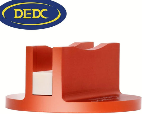 DEDC universal orange aluminum grooved magnetic jack pad with circular base.