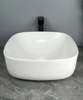 USZWBY Vessel Sinks Bathroom Vessel Sink Household Small Space Ceramic Wash Basin Desktop Art Bathroom Bowl Sink, front view on countertop.
