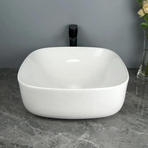USZWBY Vessel Sinks Bathroom Vessel Sink Household Small Space Ceramic Wash Basin Desktop Art Bathroom Bowl Sink, front view on countertop.