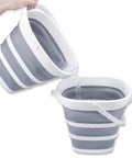 Collapsible 10L Water Bucket for Outdoor Cleaning and Camping; grey plastic bucket pouring water, with space-saving design