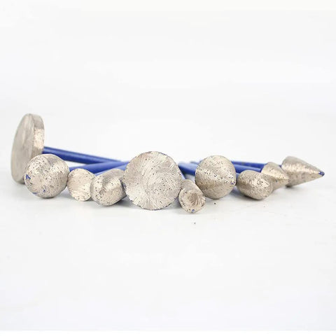 Five-Piece Sintered Diamond Burr Set With One Quarter Inch Shank for carving stone, showcasing various grinding head shapes