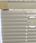 Twelve Pack Transparent Valance Clips For Window Blinds, clear clips mounted on horizontal blinds for easy installation.