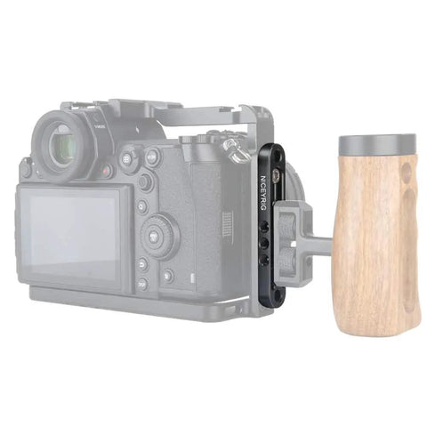 Top Shelf Camera Mounting Plate Cheese Bar Extension featuring 1/4 and 3/8 inch threads attached to a camera with a wooden grip.