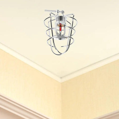 Rock Solid Heavy Duty Fire Sprinkler Head Guard Sturdy Iron Metal Shield Cover For Ceiling Pipe Setup Durable Cage Protector Built Tough As Nails For Commercial Facilities Knockout Protection ceiling-mounted iron guard with protective cage.