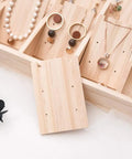Chill Solid Wood Jewelry Tray Keeps Your Bling Totally Snag Free With A Dang Cool Pendant Grid Built In For Hanging Necklaces Organizing Earrings Or Storing Loose Beads, showcasing a wooden tray with earrings and a pendant grid.