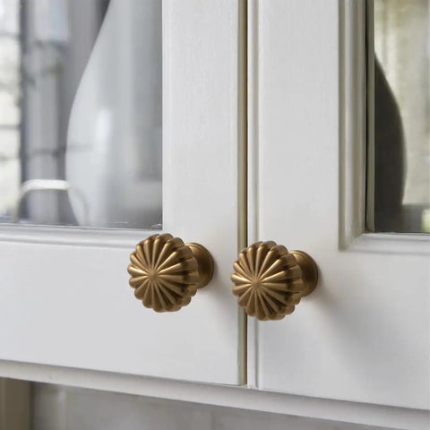Fluted design of 10 Pack Champagne Bronze Cabinet Knobs 1-1/5 Inch Round Solid Zinc Alloy Drawer Knobs Dark Gold Modern Hardware