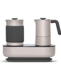 Mini Espresso Maker With Dual Pressure Extraction And Silky Milk Frother Styled Like A Classic Moka Pot in sleek gray design.