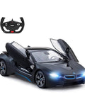 BMW I8 1:14 Scale Remote Control Car With Open Scissor Doors, Matte Black RC Toy Vehicle, car and remote visible