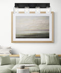 Black Vanity Lights 4-Light Modern Farmhouse Wall Fixtures With Seeded Glass Shades above a framed painting over a couch