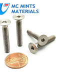 Kickin Style Titanium Bolts M5x30mm Countersunk Flat Head Fasteners Multicolor Heavy Duty Hardware For Motorcycle Chassis Bike Frames And Vehicle Mods Built Sick Ride Ready Gear Pack with a penny for size reference.