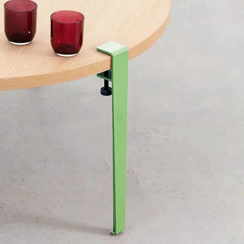 Badass Four Pack Iron Table Legs With Height Adjustment And Built In Leveling Pads For Coffee Dining Tables Or Workbenches, shown on a round wooden table.