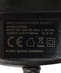 9V 500mA Regulated Power Supply For RC-5 Loop Station Adapter with product label, includes input/output details, "Surrey Musical Equipment"