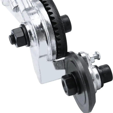 Close-up of the drill-mounted metal nibbler attachment for Upgrade Your Shop With This Electric Drill Shears Attachment.