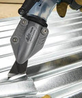 TurboShear Drill Attachment For Corrugated Metal Roofing cutting through a metal panel, showcasing 360-degree rotation and heavy-duty design.