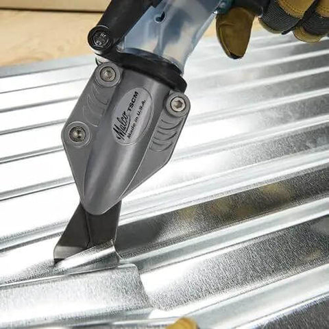 TurboShear Drill Attachment For Corrugated Metal Roofing cutting through a metal panel, showcasing 360-degree rotation and heavy-duty design.
