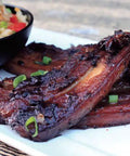 Quick Fix Thermomix Recipe Book Loaded With Easy Weeknight Dinners And Killer Meal Prep Hacks Perfect For Busy Home Cooks Looking To Knock Out Tasty Homemade Feats Daily, featuring grilled ribs on a plate.
