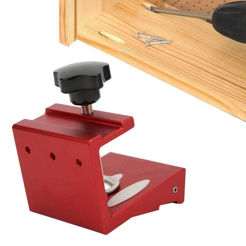 Red Pocket Hole Drill Guide Aluminum Alloy Woodworking Jig For Precise Hidden Joints And Fast Furniture Assembly next to wooden plank