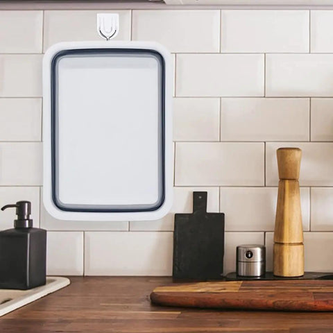 Collapsible Dish Pan 10L Folding Sink Basin for Dishwashing Camping RV and Vegetable Cleaning hanging in kitchen.