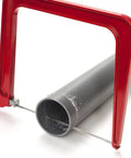 Heavy Duty Frame Coping Saw With Five Interchangeable Blades For Cutting Wood Metal Plastic Rods And Pipes Straight Up Built To Last, cutting through a PVC pipe.