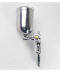 Shop Grade Pneumatic Spray Gun With Gravity Feed delivers smooth finishes, featuring a stainless steel cup and precise nozzle for automotive use.