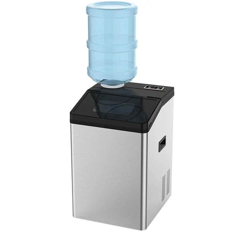 Bad Ass High Capacity Ice Maker Pumping 55 Kilos Of Round Cubes Daily For House Parties And Local Bars With Sick Heat Dissipation and Zero Hassle Plus Top Shelf Performance, silver body with water bottle.