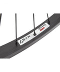 Close-up of Rear 26 Inch Wheel Set 26x1.75 To 2.125, 36H, 14G Black Spokes, showing Weinmann 519 label on black aluminum rim