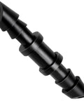 Close-up of black double barbed connector from All In One One Quarter Inch Barbed Coupling Fittings Kit For Drip Irrigation 110 Piece Universal.