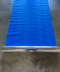Four By Two Hundred Fifty Foot Synthetic Roof Underlayment Pro Grade Heavy Slick Roll shown on a flat surface, blue mat unrolled.