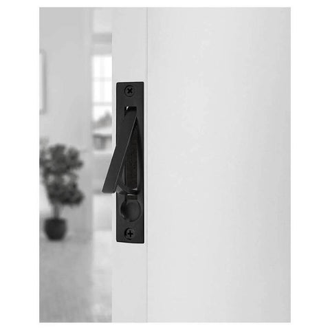 Edge Pull Latch Set For Barn Doors And Closets, Solid Forged Brass Handles In Matte Black, installed on white door