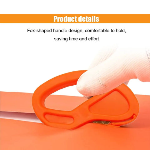Close-up of Multi Tool Wrapping Paper Cutter tool cutting paper, orange fox-shaped handle, held by gloved hand.