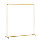 Heavy Duty Industrial Clothes Rack With Golden Floor Standing Coat Stand for Bedroom or Entryway, minimalist gold iron frame.