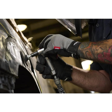 Ingersoll Rand 301B right-angle air die grinder on a car body panel; aluminum housing