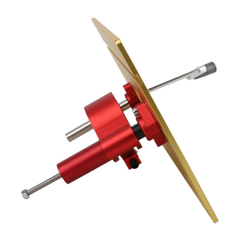 Gonna Nail Every Joint This Hella Stable Manual Router Lift Table Kit With Heavy Duty Aluminum Base Plate For Diy Woodworkers Seeking Smooth Cuts And Reliable 47mm Travel In Gold side view of aluminum router lift with red components.
