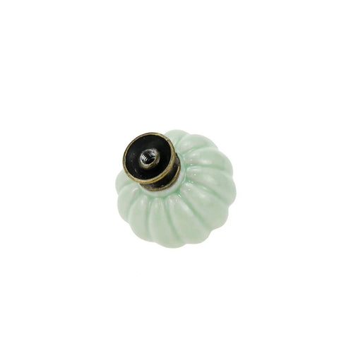 Fresh Vintage Light Green Ceramic Pumpkin Drawer Knobs And Cabinet Pulls With No Mess Installation For A Fast Furniture Glow Up That Brings Sweet Cozy Vibes To Your Kitchen And Pantry. Top view of 33mm wide ceramic pumpkin knob.