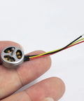 1103 Beefy High Speed Brushless Motor 15000KV For RC Drones And Micro Fixed Wing Planes on fingertip for scale