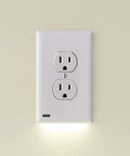 GuideLight Duplex Outlet Night Light With LED Sensor No Brainer Snap On Wall Plate Replacement shown on a beige wall