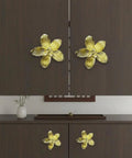 2 Pack Gold Flower Drawer Knobs For Cabinets And Furniture Dope Brushed Gold Finish Vintage Vanity Knobs on dark wood cabinet.