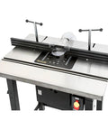 Solid Black Router Table With Precision Height Lift Slick Woodworking Station with reinforced steel and precise lift.