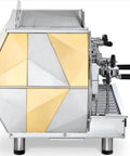 Side view of a 2 Group Volumetric Espresso Machine Gold Finish With 4 Cup Dosing Keypad, Dual Pivoting Steam Wands.
