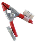 Close-up of a 2-inch metal spring clamp with red grips and built-in magnet from 12 Pack 2 Inch Metal Spring Clamps With Built In Magnets For Magnetic Surfaces Handy Hands Free Holding Multipurpose Clip Holders For Tools Crafts DIY Projects And Workshop Organization.