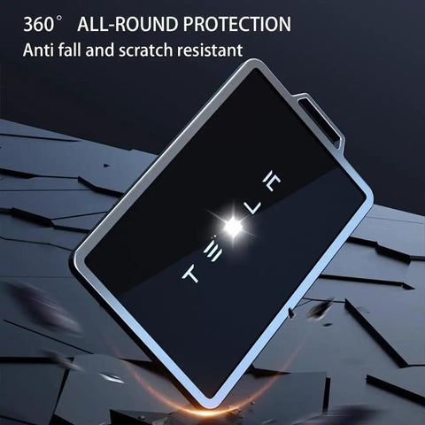Slick Tesla Key Fob And Key Card Holder Case Hella Protective Ultra Thin Armor Shell For Model 3 Y X S Cybertruck on rugged surface.