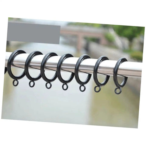 24 Pack Curtain Rings Clips Black Drapery Holders For Easy Hanging And Smooth Glide On Compatible Curtain Rods displayed outdoors