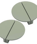 Two green half moon cabinet pulls in 4 Pack Half Moon Cabinet Pulls With 2.5 Inch Center To Center, semicircle design, solid brass hardware.