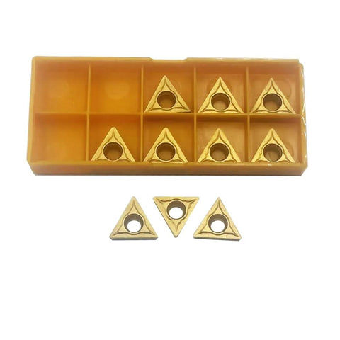 Twenty triangular carbide inserts in a yellow organizer box; TCMT32.51/32.52 and TCMT16T304/16T308 for metal cutting